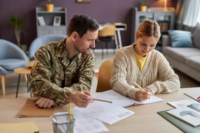 Military veteran studying with another student